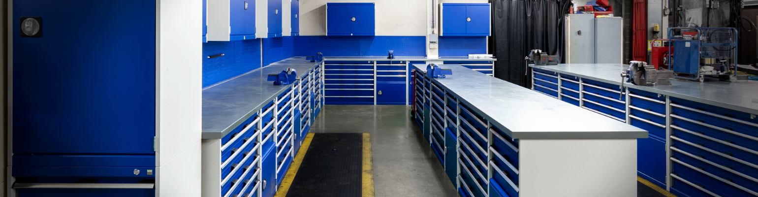 Maintenance workshop interior fitted out with blue Bott cabinets